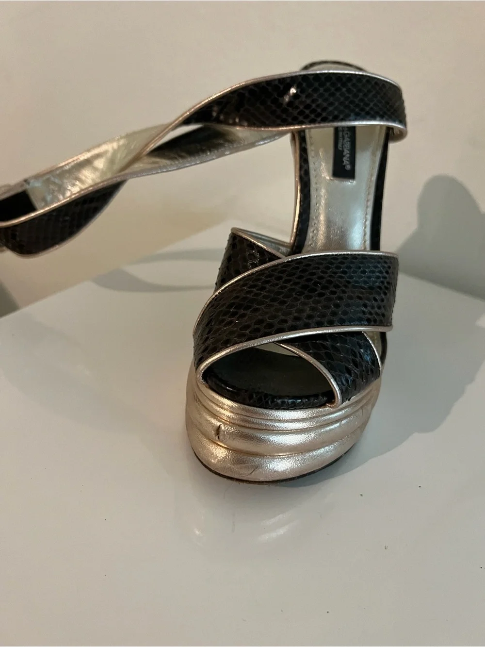 Dolce & Gabbana Black Snakeskin Wedge Sandals with Gold Accents..